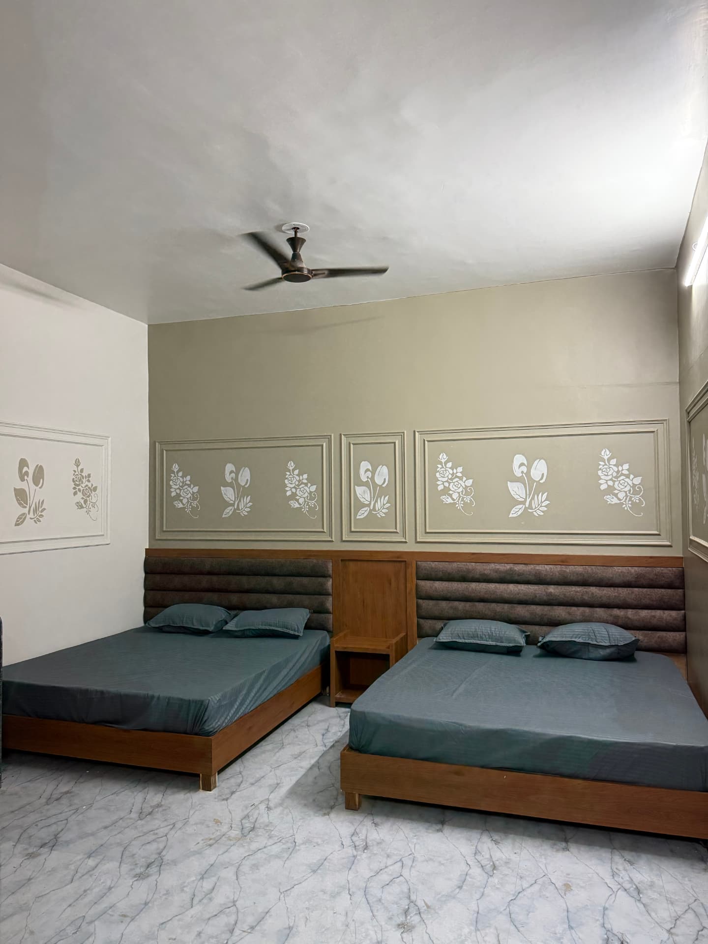 JSR Palace triple occupancy room with twin double beds, Pushkar